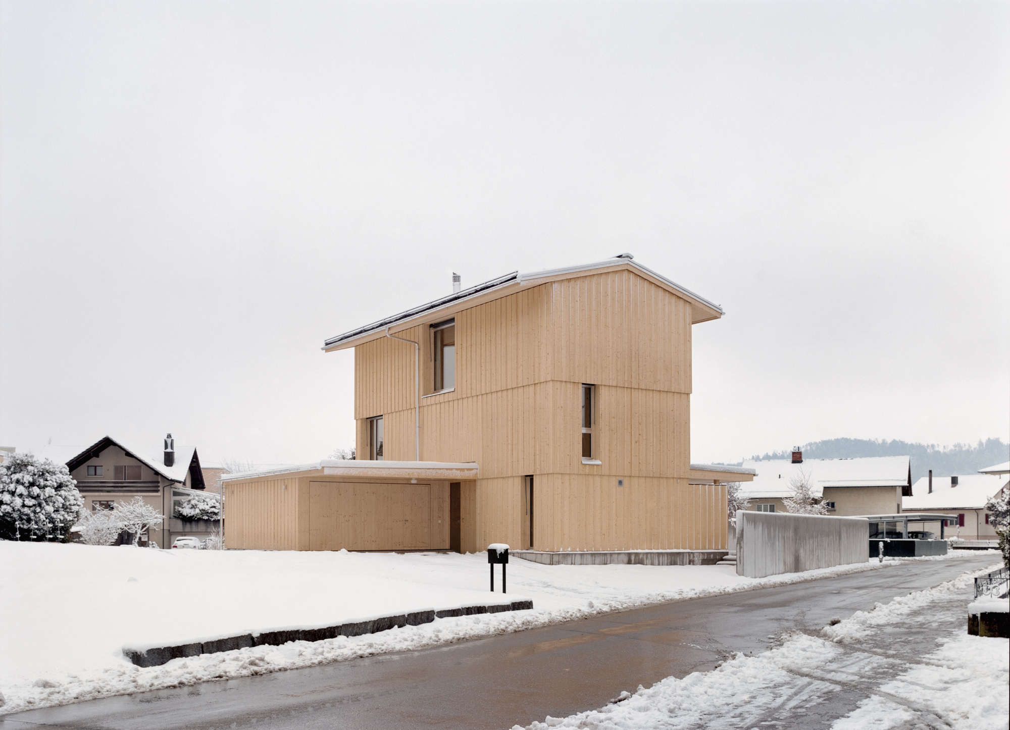 Tower House / kit — дом для семьи на треугольном участке в Санкт-Галлене