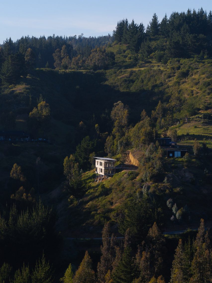 Chilean modular housing prototype uses stilts to traverse difficult site