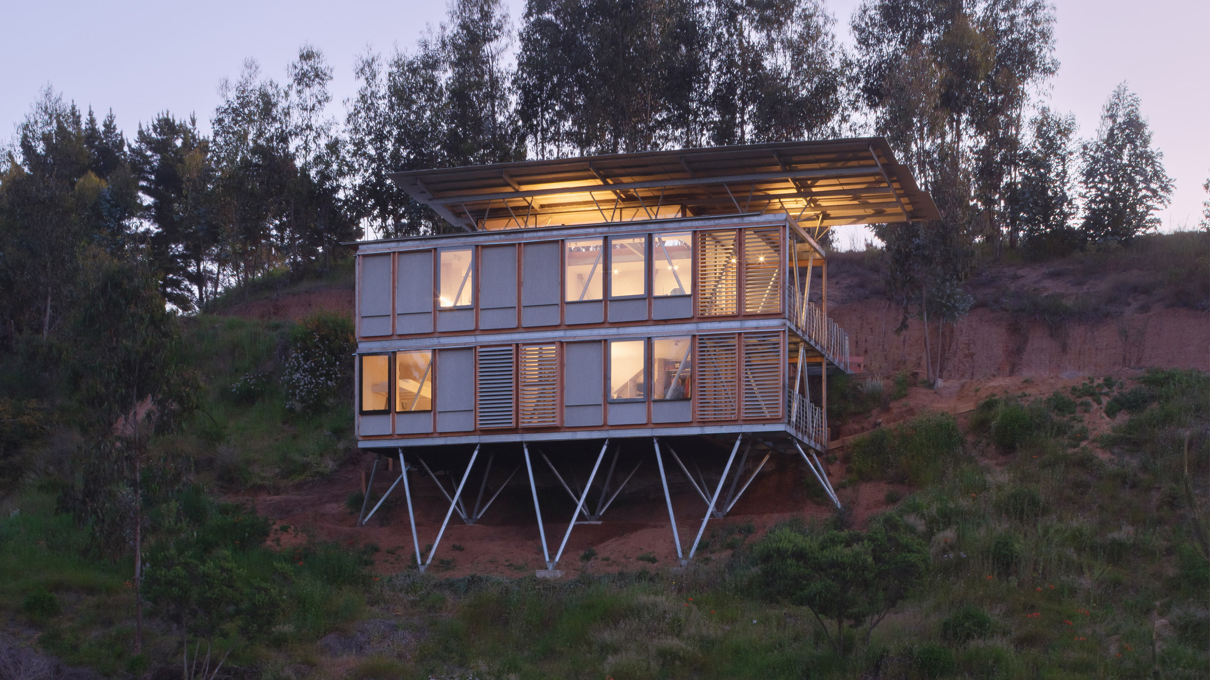 Chilean modular housing prototype uses stilts to traverse difficult site