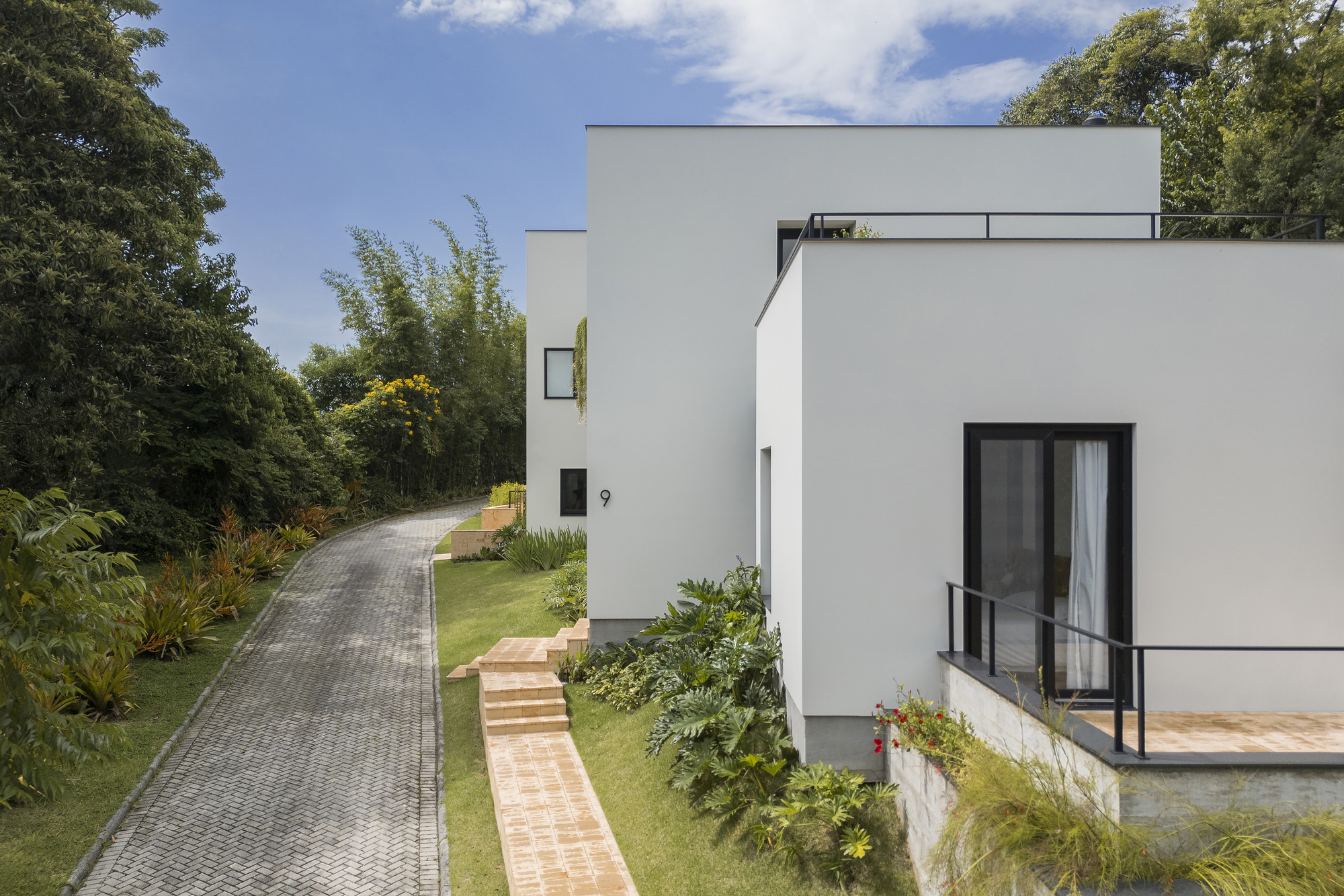 Casa Piná / Nommo Arquitetos: дом, выросший из памяти места