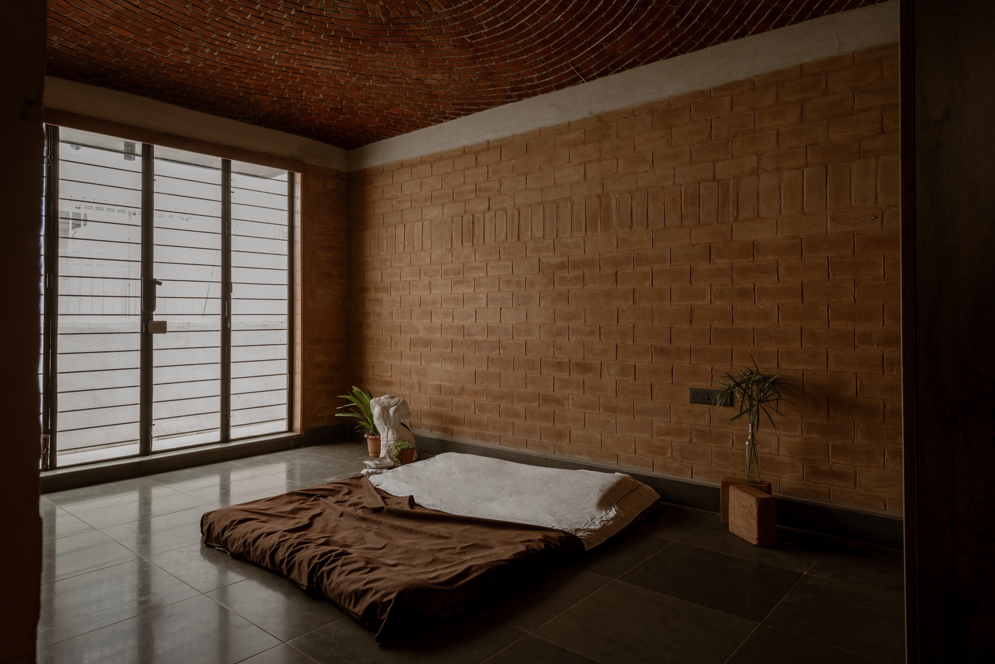Sudhagar's Mud House / Aagaram Architects