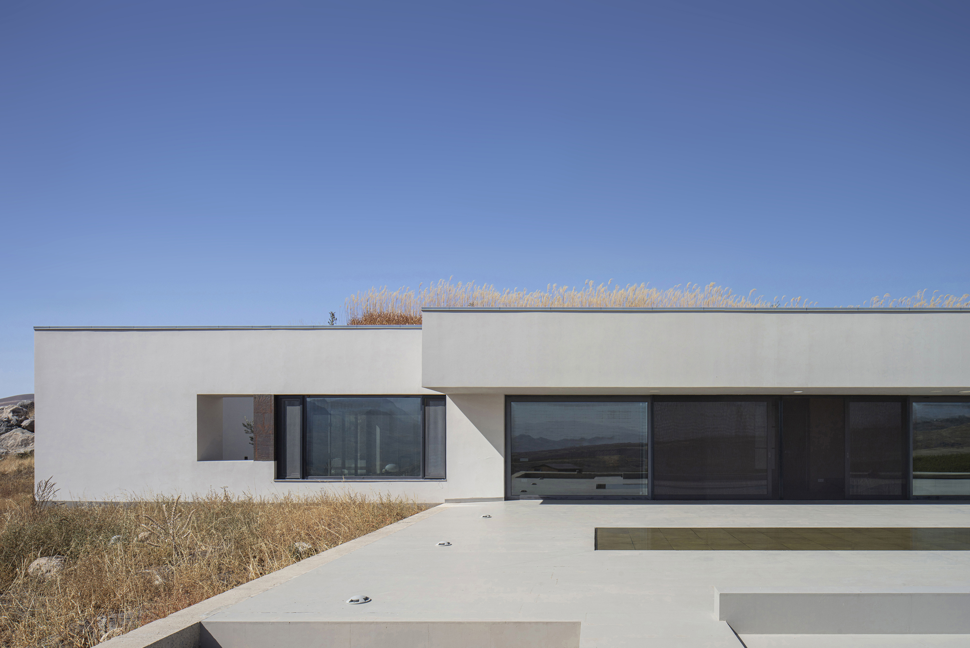 Вилла в деревне Ринд / ARCHcoop Architectural Studio