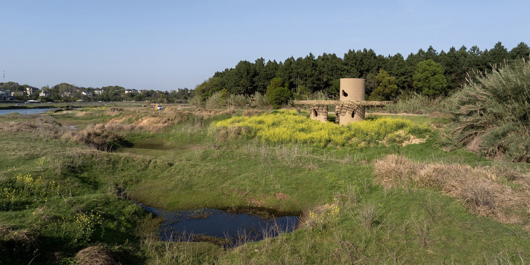 Wetland Caves от Studio 10: павильон-«пещера» в ландшафте болот Qu River