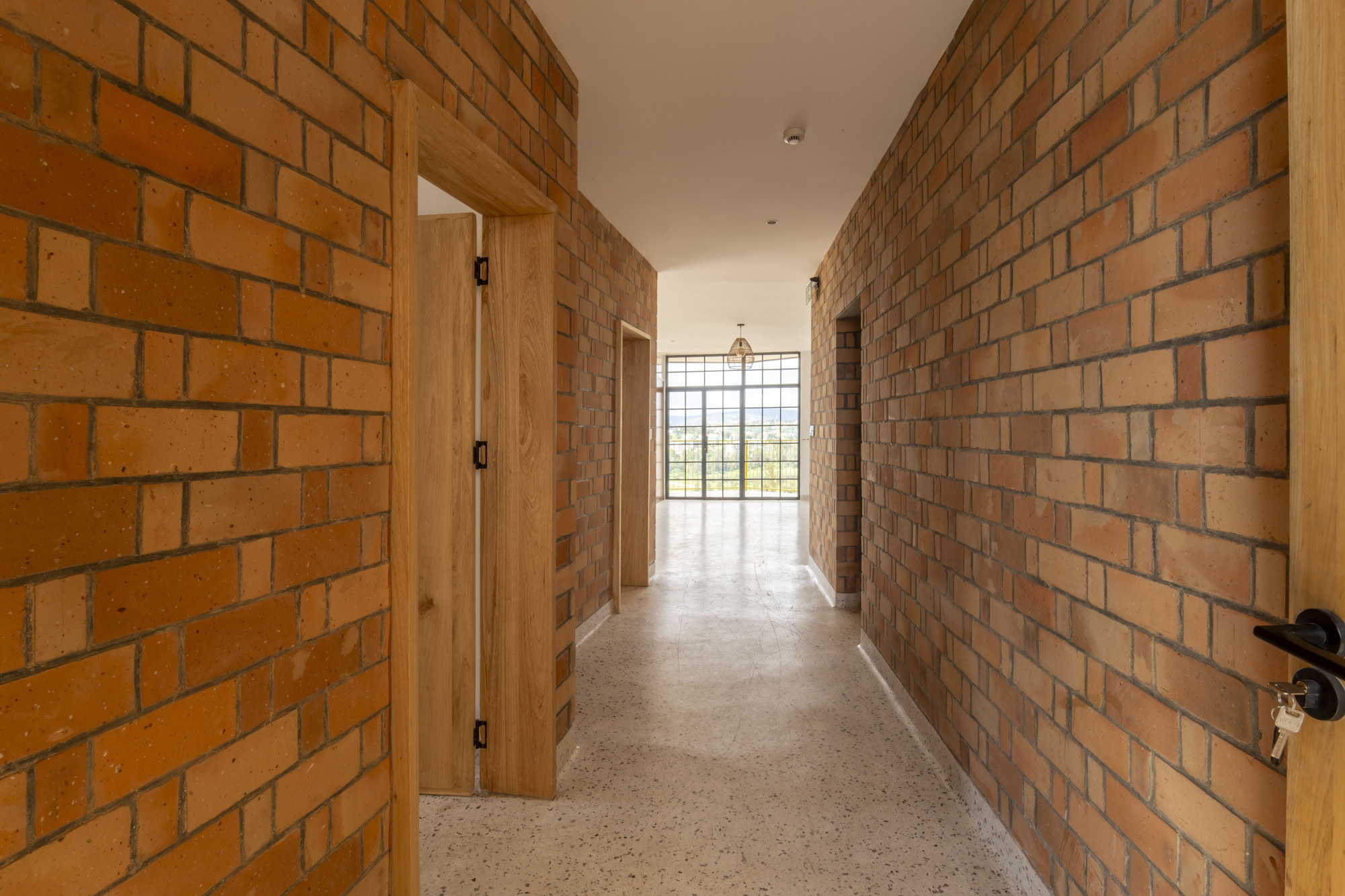Brick Tower Mixed Use Building / ASA Studio — кирпичная башня смешанного назначения в Кигали