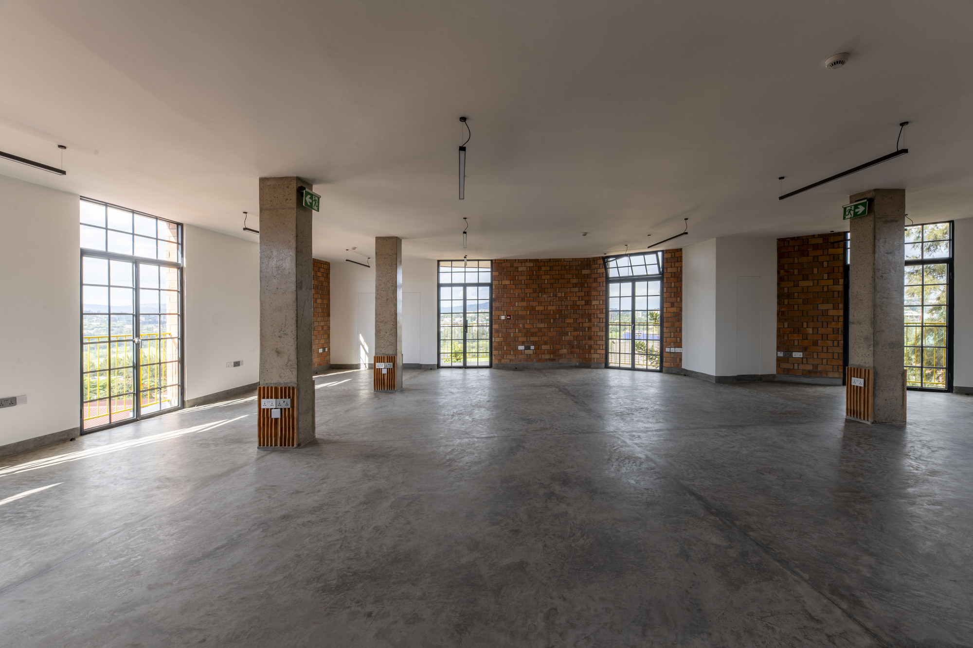 Brick Tower Mixed Use Building / ASA Studio — кирпичная башня смешанного назначения в Кигали