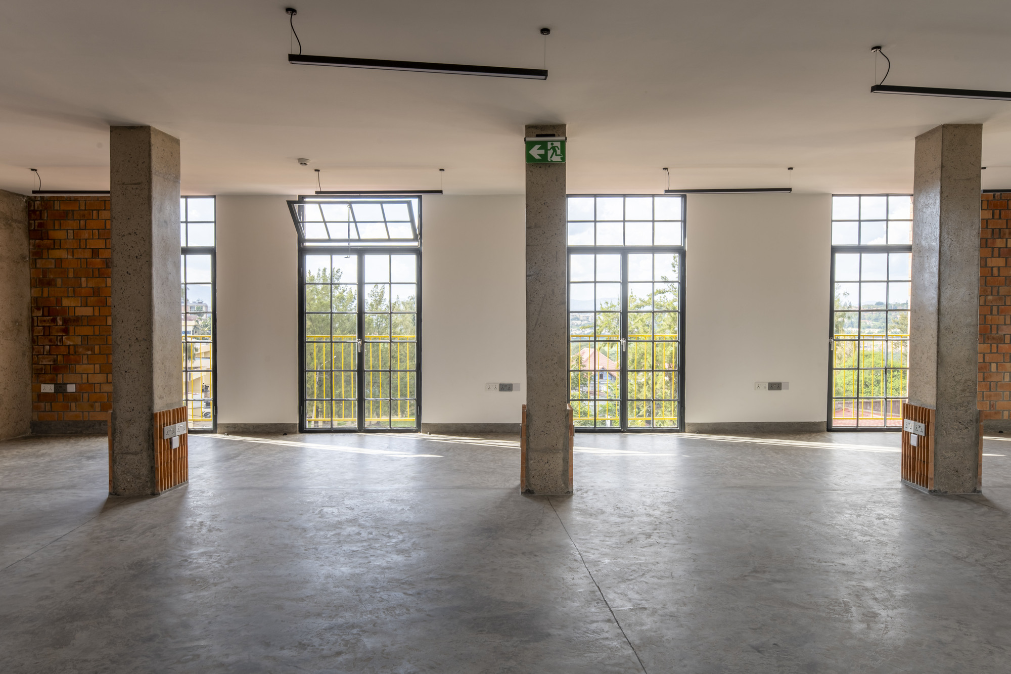 Brick Tower Mixed Use Building / ASA Studio — кирпичная башня смешанного назначения в Кигали