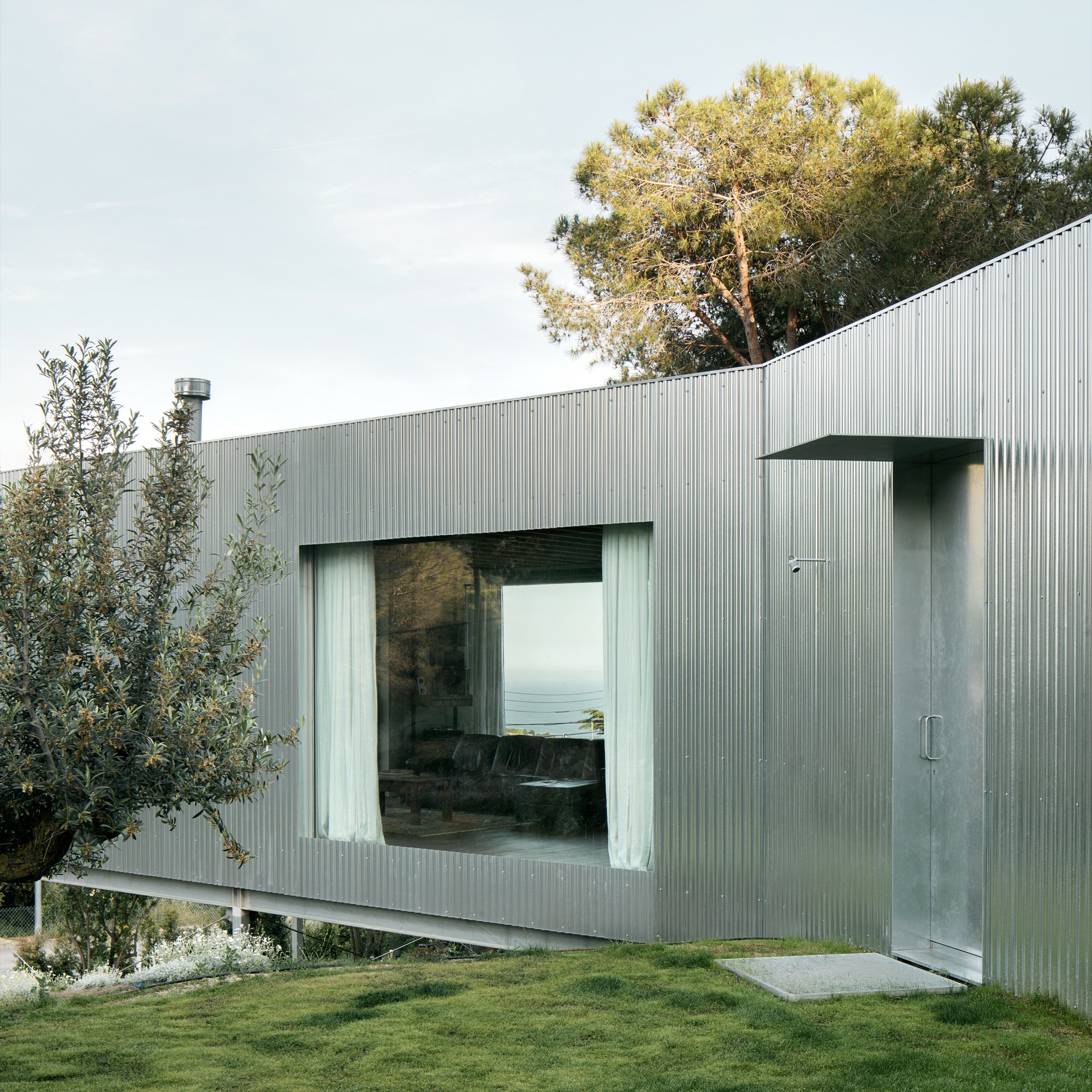 Casa 144º / Jaime Prous Architects