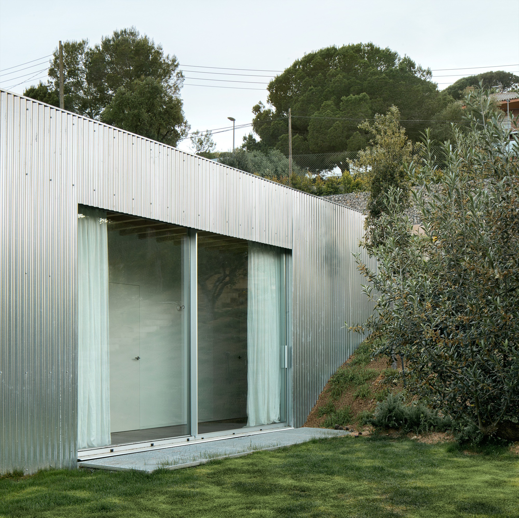 Casa 144º / Jaime Prous Architects