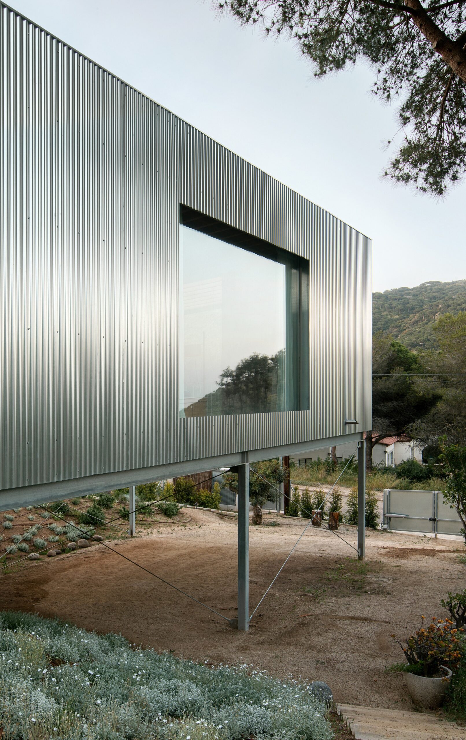 Casa 144º / Jaime Prous Architects