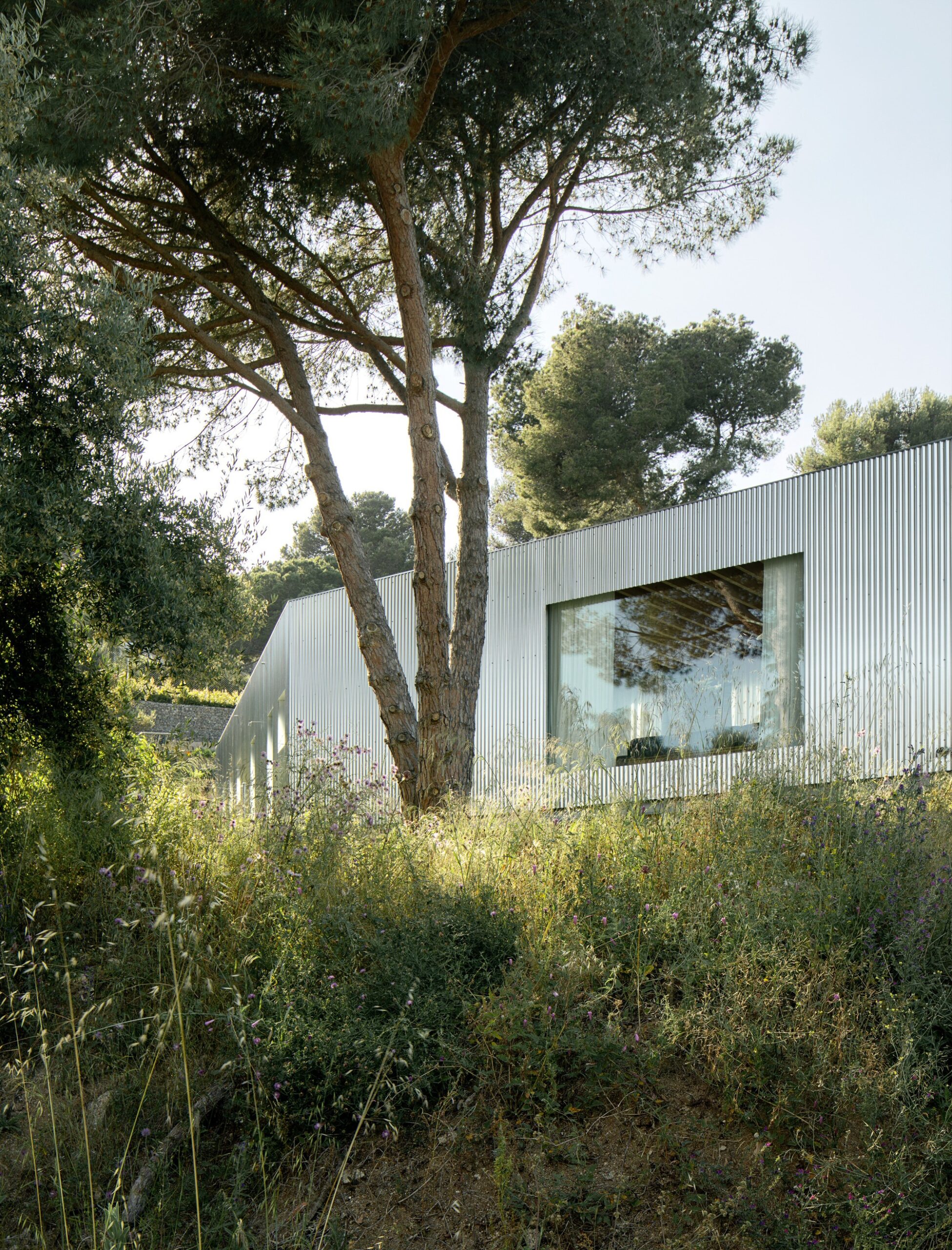 Casa 144º / Jaime Prous Architects