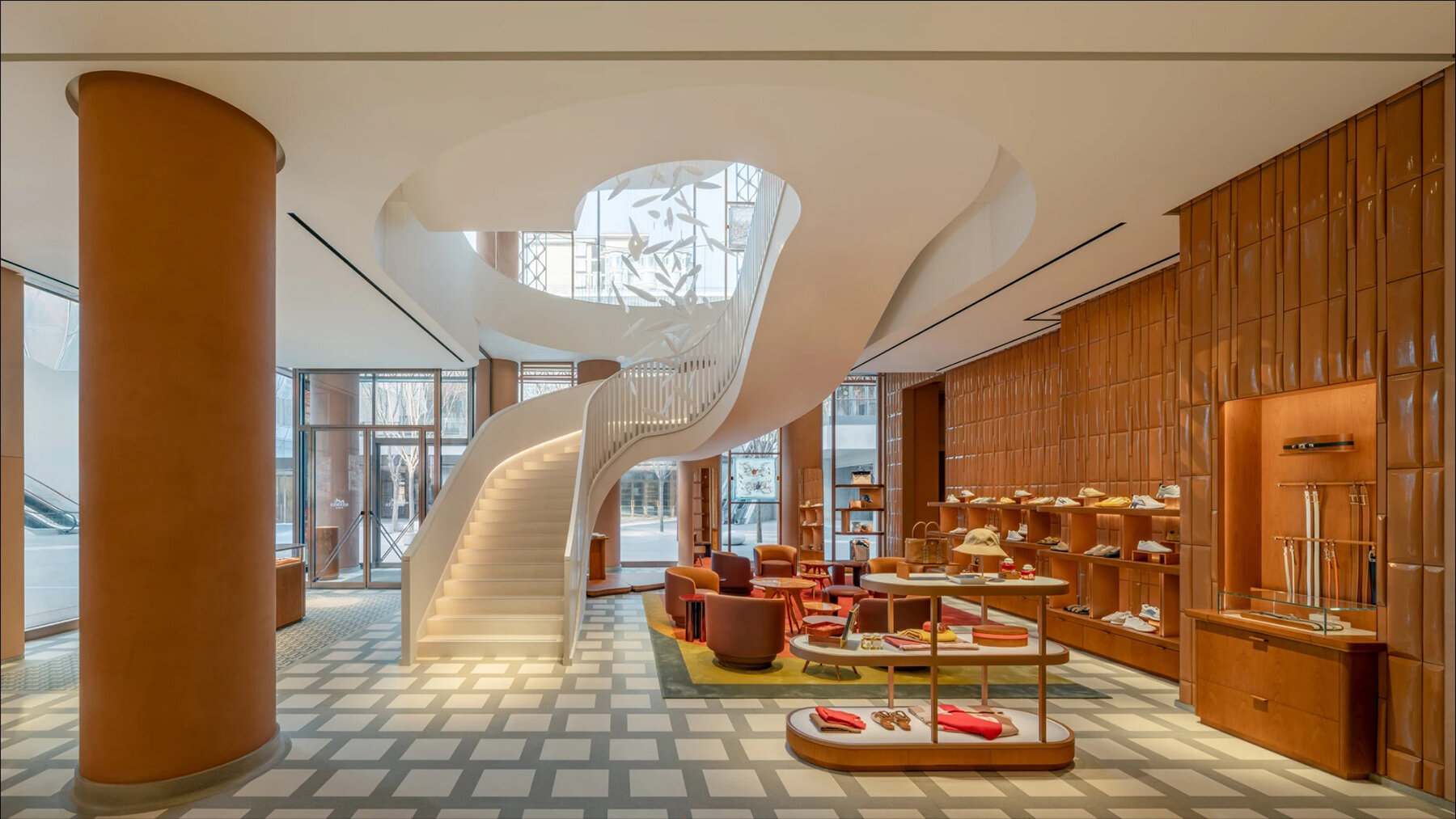 Флагман Hermès в Пекине получил розово-терракотовую керамическую оболочку от Mamou-Mani и RDAI