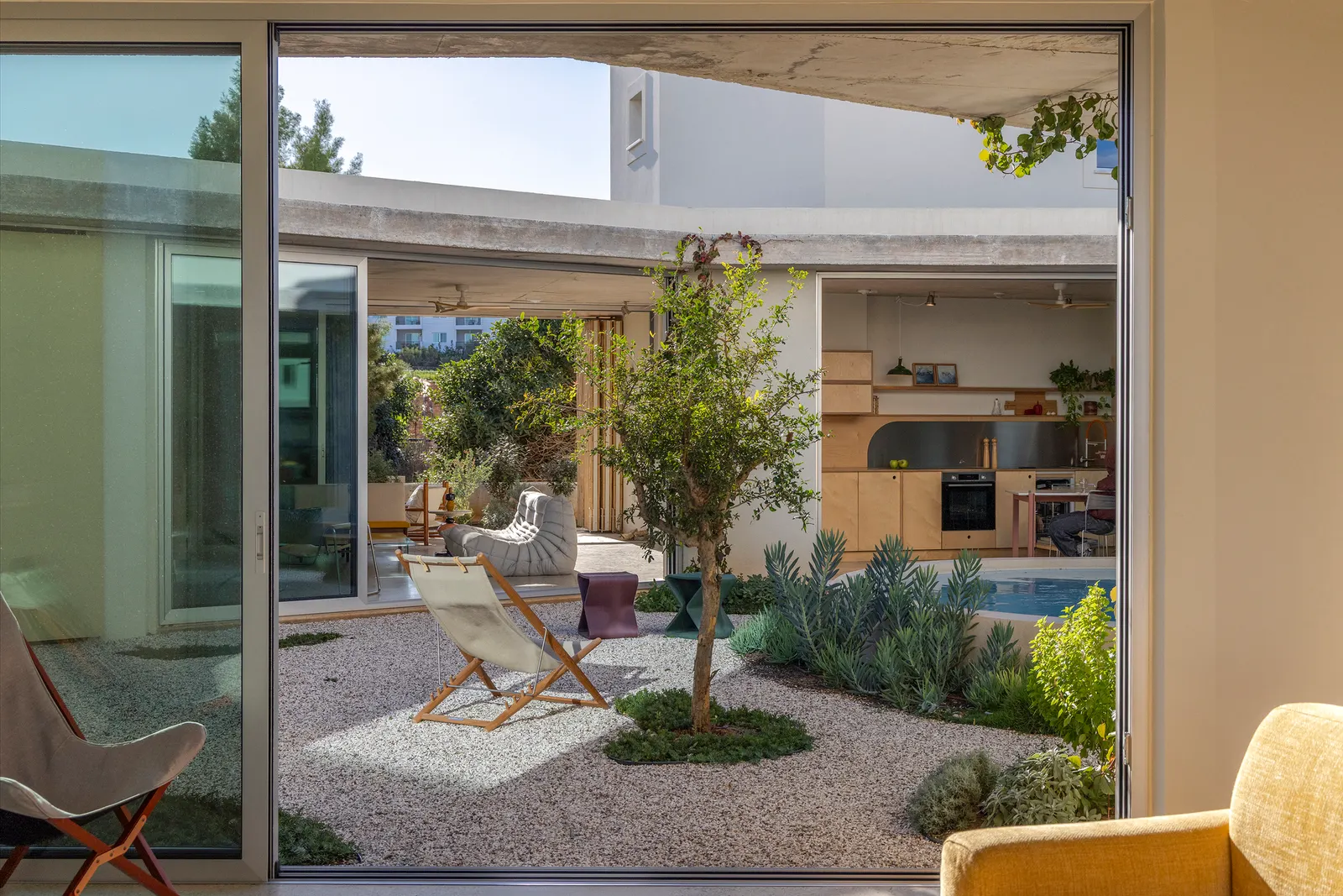 The Avlí Houses / Ona i Ona Architecture and Design