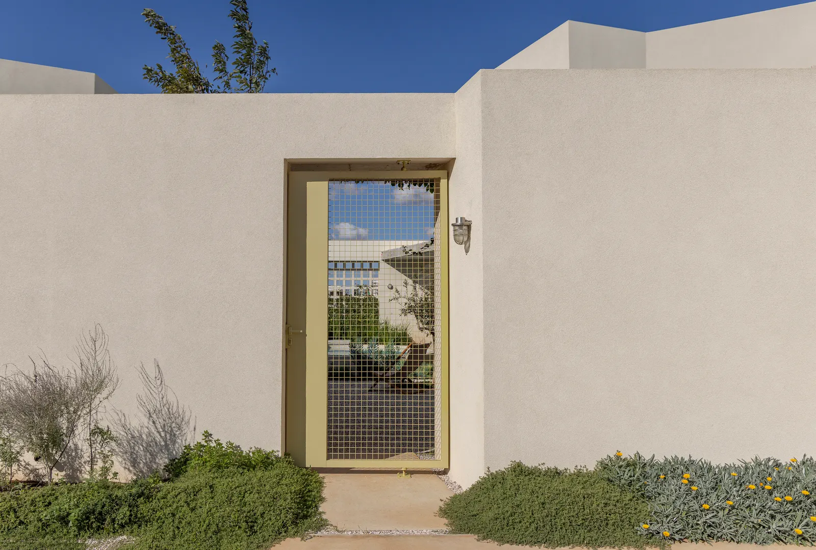 The Avlí Houses / Ona i Ona Architecture and Design