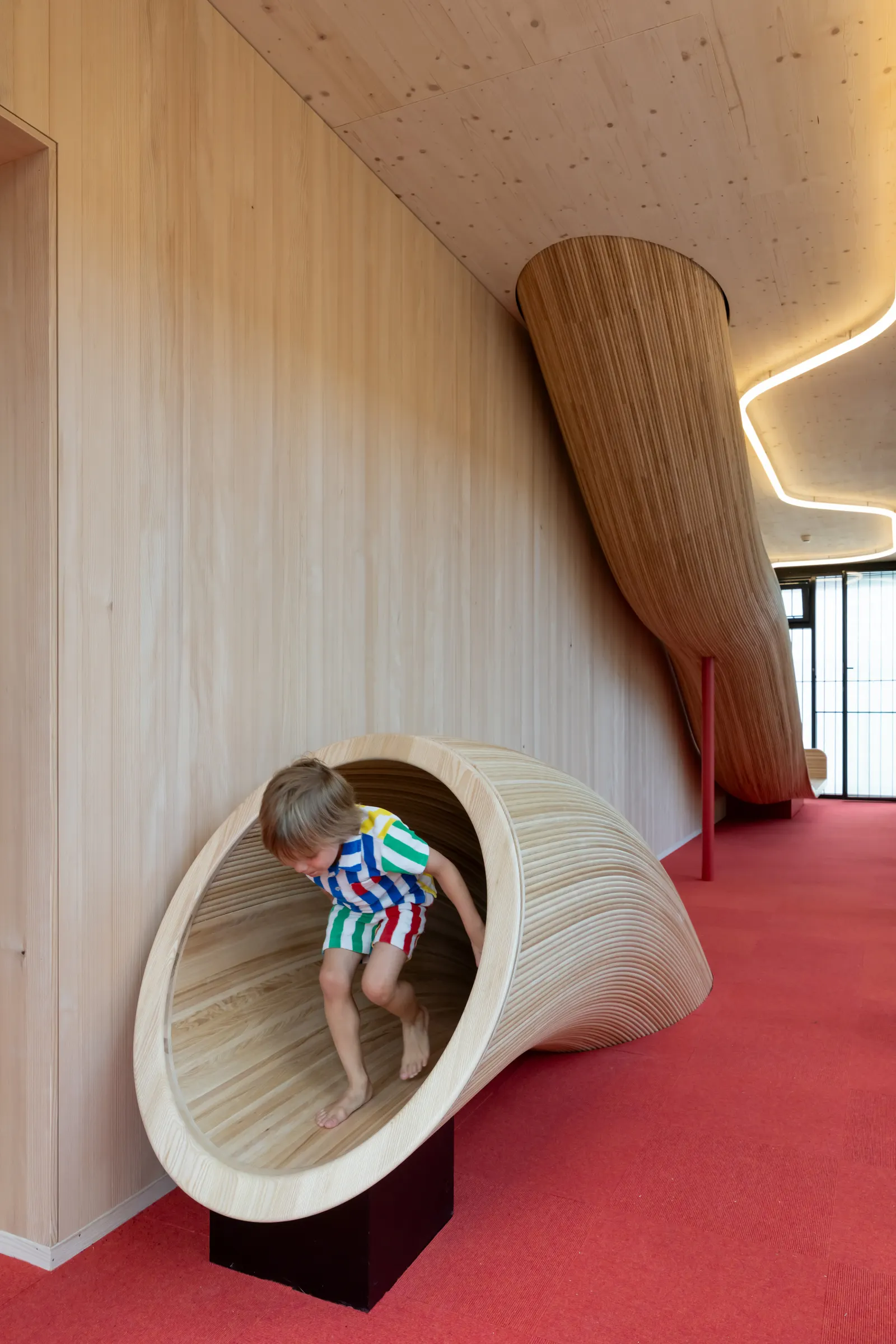 Детский сад Kinderoase в Мюнхене для Технического университета — Kéré Architecture и HK Architekten