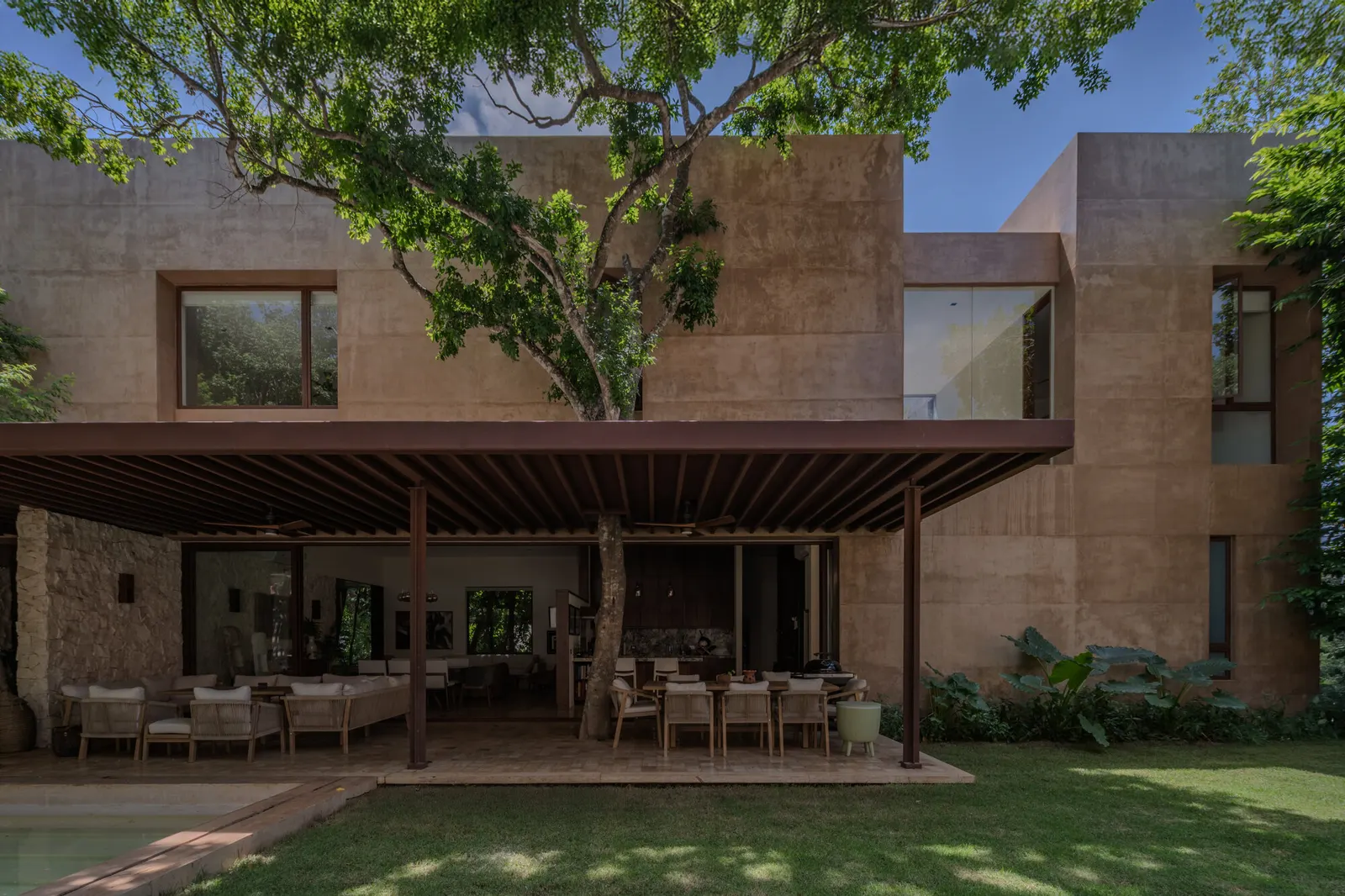 Sodzil House / Esencial Studio