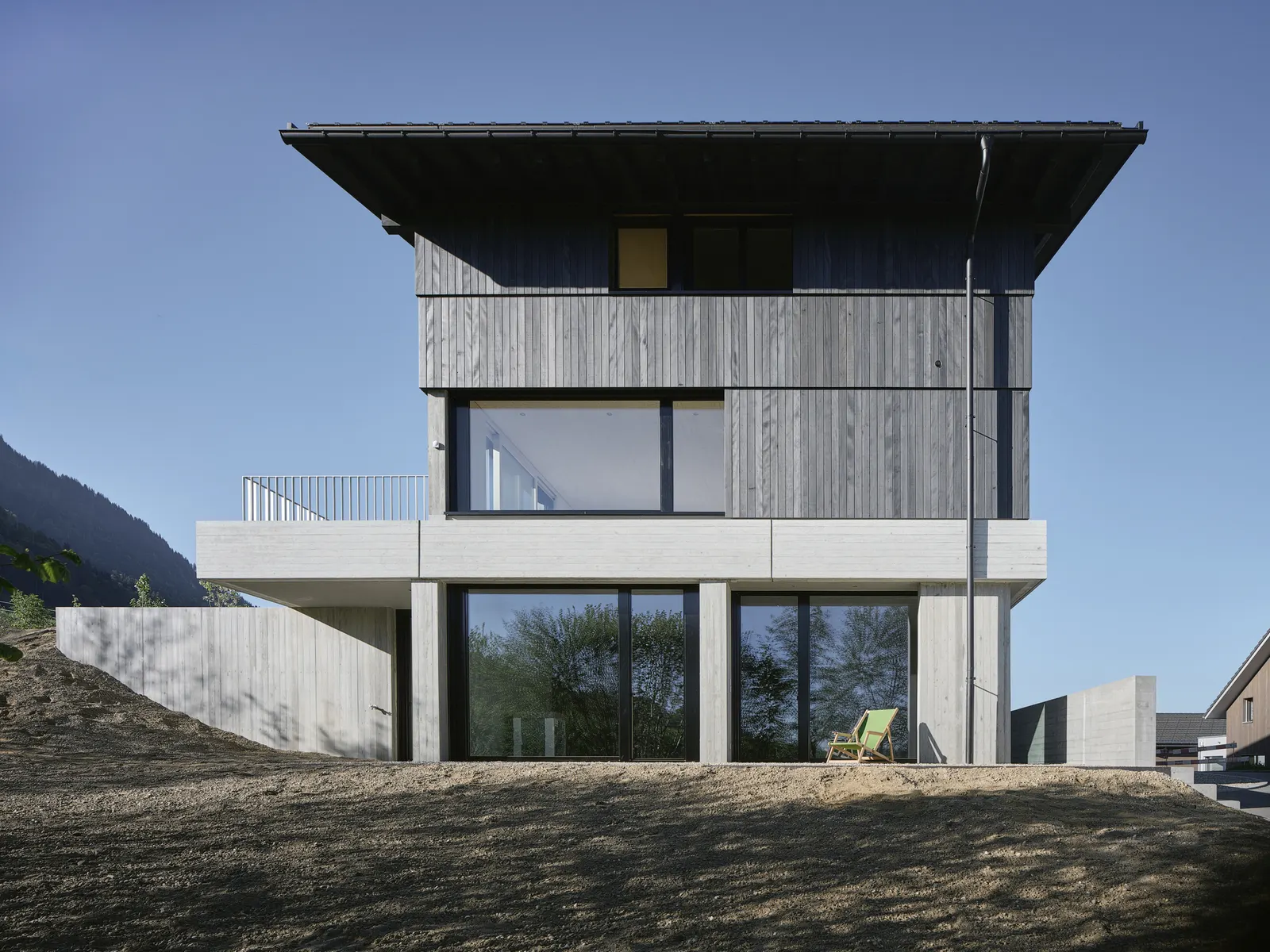 Дом на бетонных стенах в Шюпфхайме / dolmus Architekten