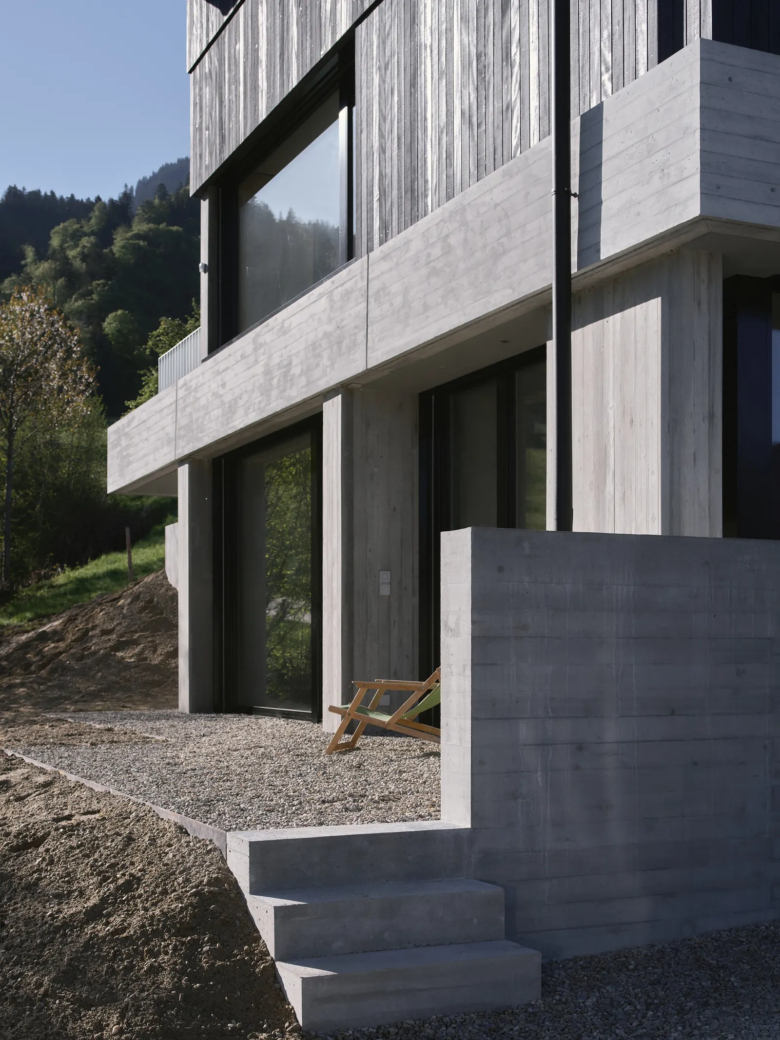 Дом на бетонных стенах в Шюпфхайме / dolmus Architekten