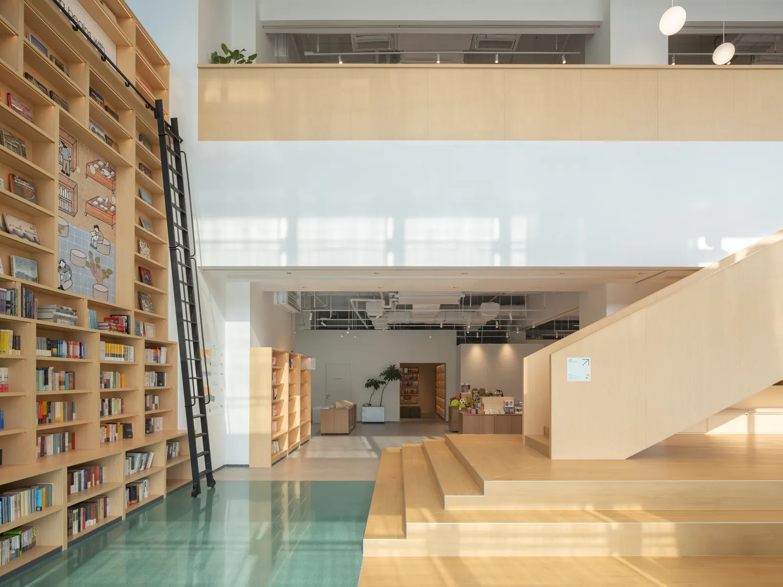 PAGEONE Bookstore at Wuxi Park Station / llLab