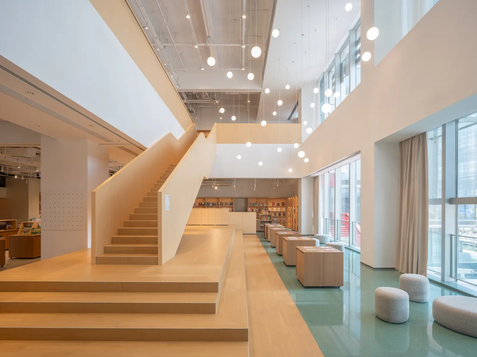 PAGEONE Bookstore at Wuxi Park Station / llLab