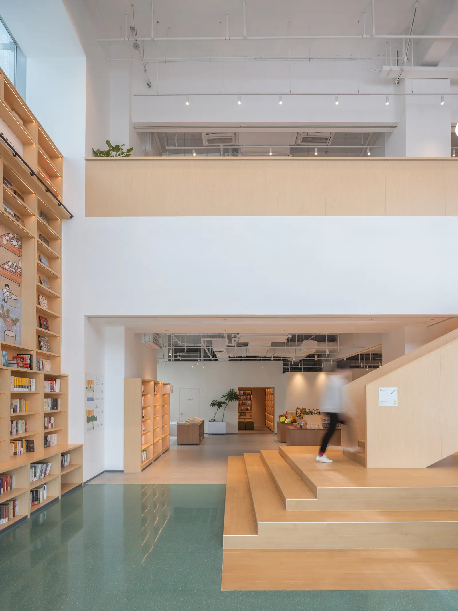 PAGEONE Bookstore at Wuxi Park Station / llLab