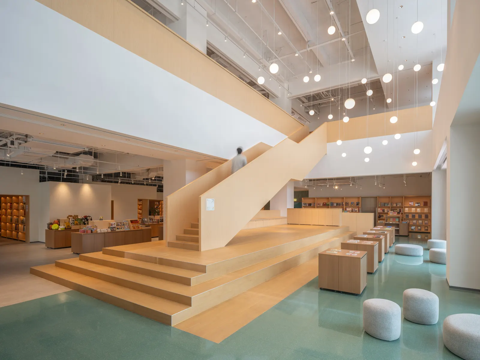 PAGEONE Bookstore at Wuxi Park Station / llLab