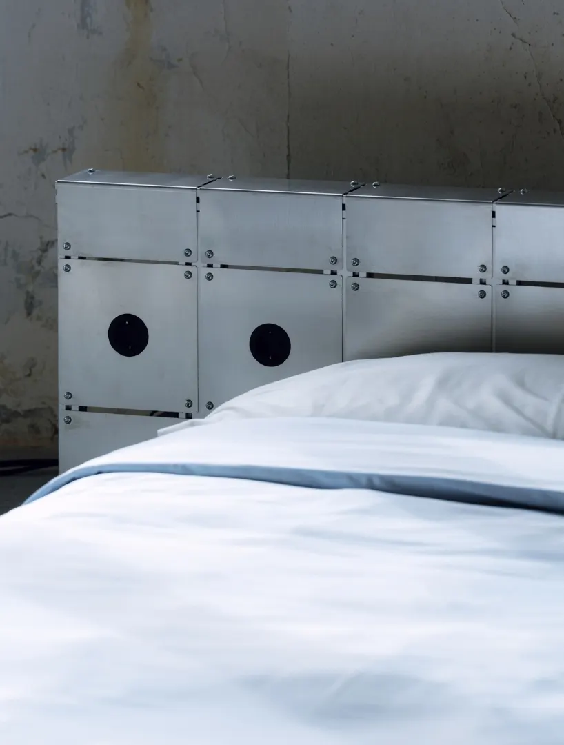 ALUMINUM AND BOLTED STEEL TURN PLATFORM BED INTO AN ARCHITECTURAL PIECE AT PARIS DESIGN WEEK
