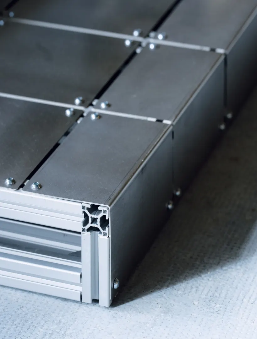 ALUMINUM AND BOLTED STEEL TURN PLATFORM BED INTO AN ARCHITECTURAL PIECE AT PARIS DESIGN WEEK