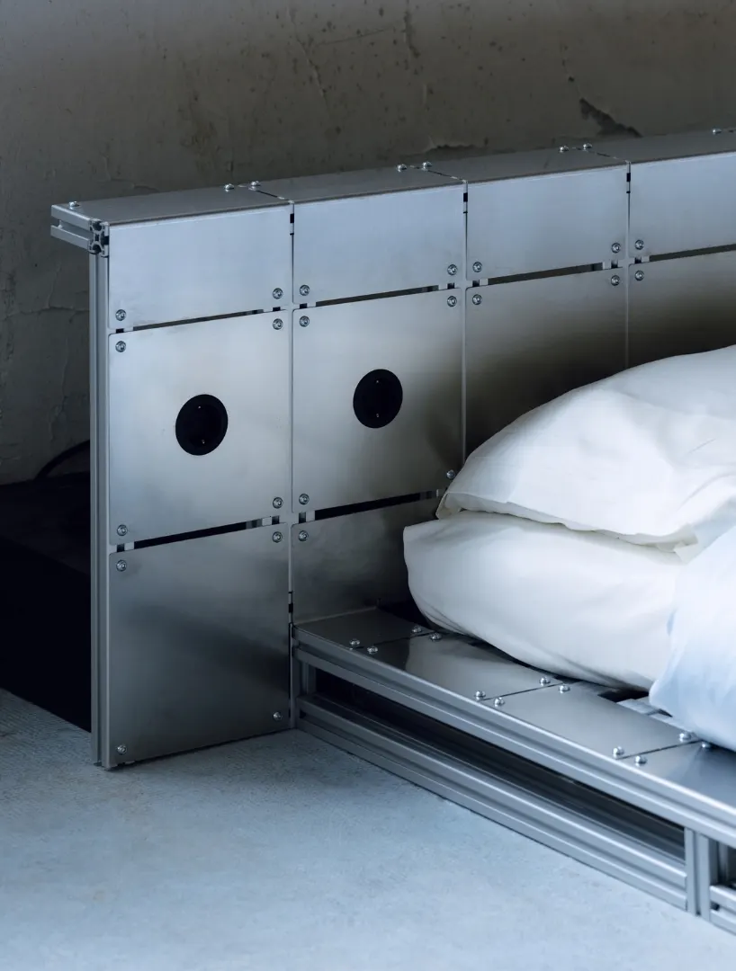 ALUMINUM AND BOLTED STEEL TURN PLATFORM BED INTO AN ARCHITECTURAL PIECE AT PARIS DESIGN WEEK