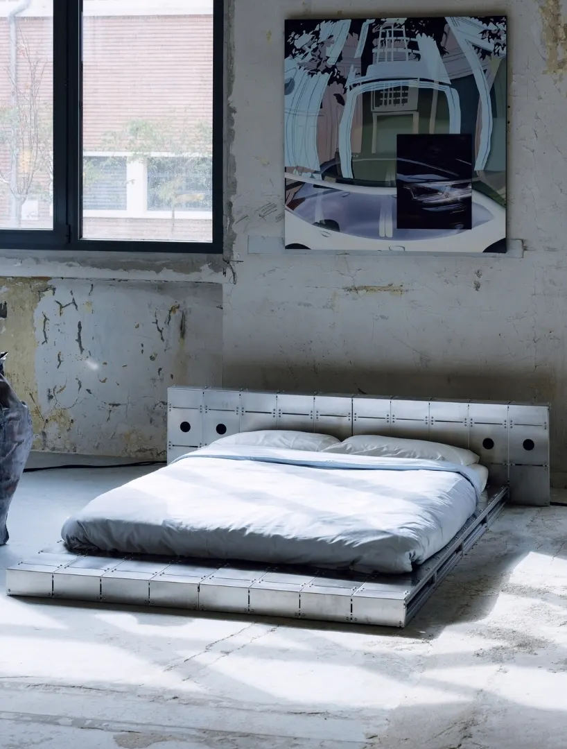 ALUMINUM AND BOLTED STEEL TURN PLATFORM BED INTO AN ARCHITECTURAL PIECE AT PARIS DESIGN WEEK