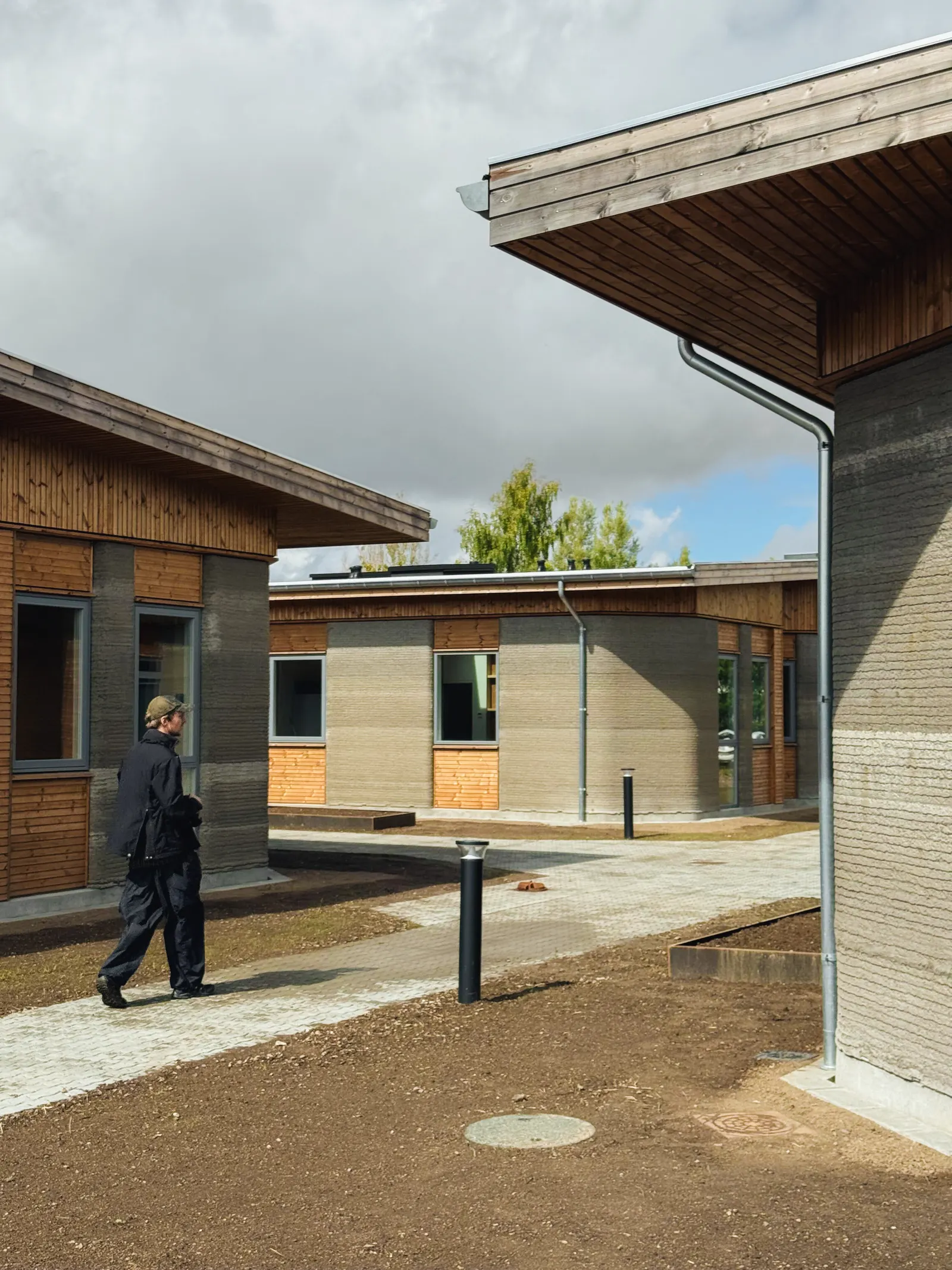 SAGA Space Architects и 3DCP Group завершили 36-квартирный студенческий поселок с 3D-печатью в Дании
