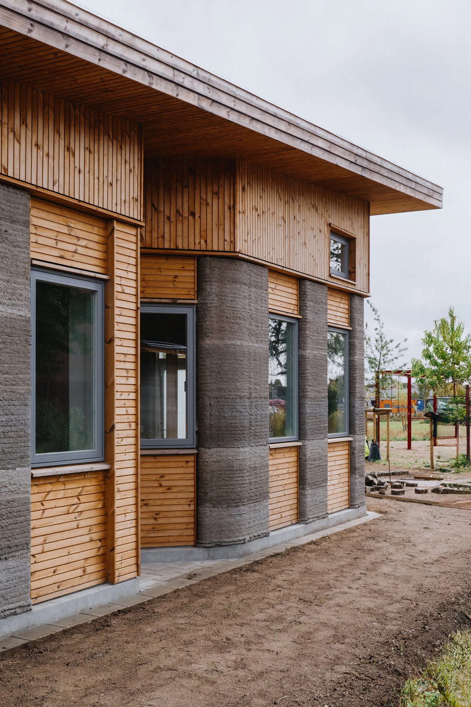 SAGA Space Architects и 3DCP Group завершили 36-квартирный студенческий поселок с 3D-печатью в Дании