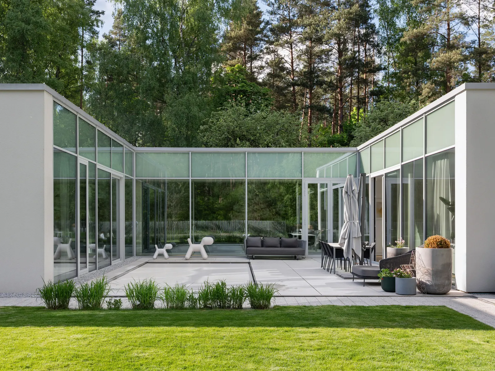Жилой дом в Вильнюсе: проект Architectural Bureau G.Natkevicius & Partners в ландшафте заповедника