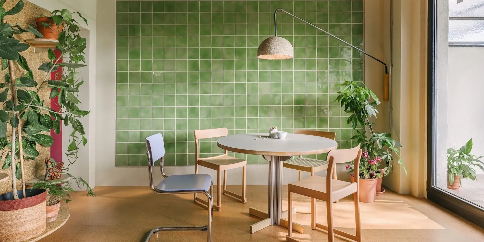 Stepped Timber Platforms and Operable Textiles Shape Circular Düsseldorf Home by Urselmann Interior