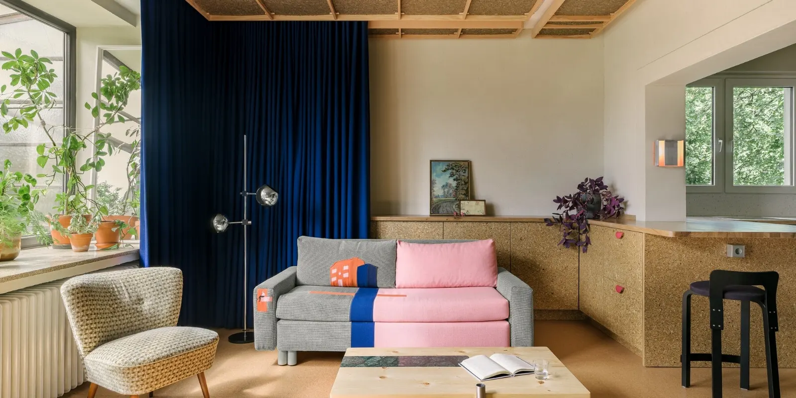 Stepped Timber Platforms and Operable Textiles Shape Circular Düsseldorf Home by Urselmann Interior