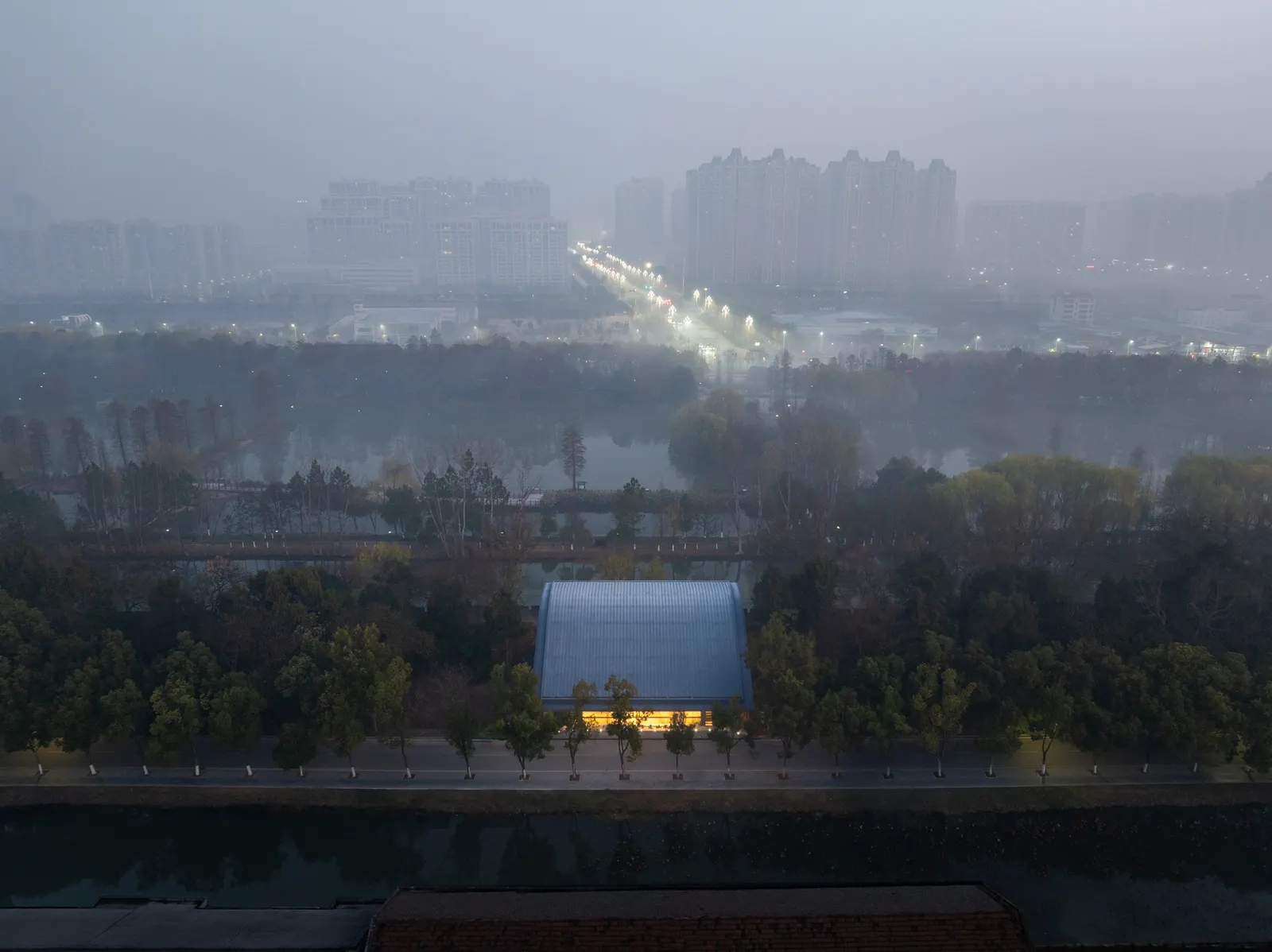 Jingzhou City Wall Archaeological Site Exhibition Pavilion / Qing Studio