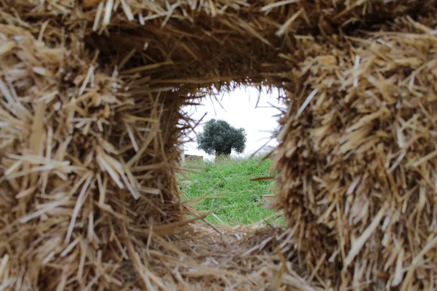 KURA: straw land art with amphitheater, experimental garden and walking path in rural Spain