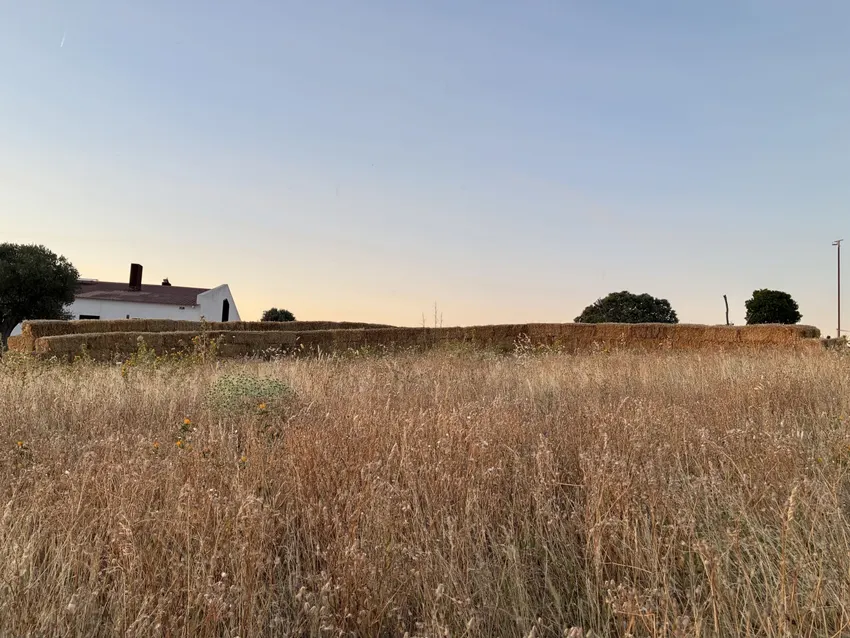 KURA: straw land art with amphitheater, experimental garden and walking path in rural Spain