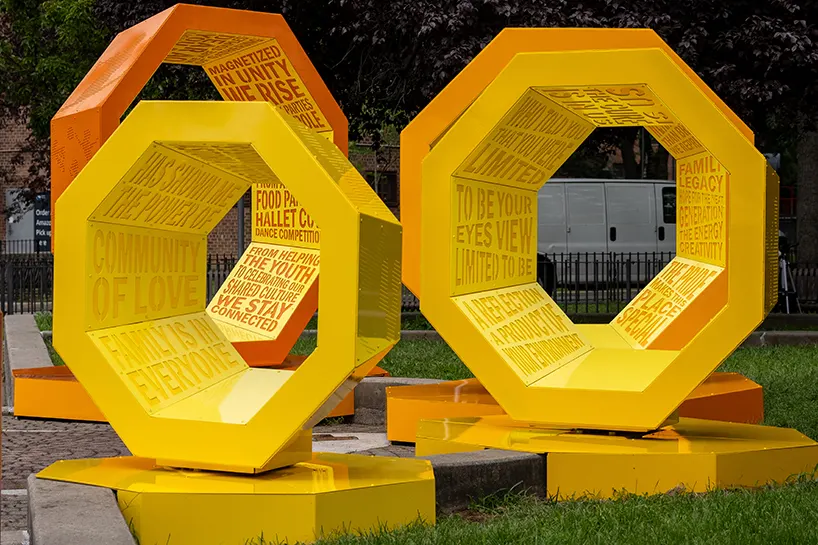 Rotating octagonal forms and community voices shape a Queens public landmark