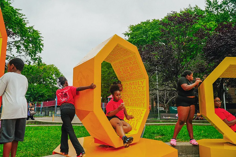 Rotating octagonal forms and community voices shape a Queens public landmark
